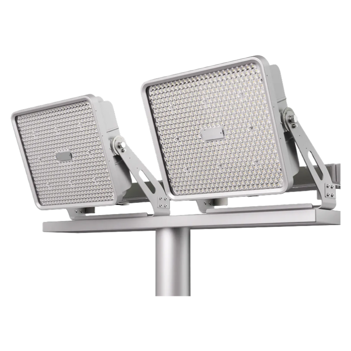 Two outdoor floodlights on a white background