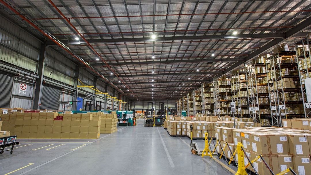 What is the difference between high bay and low bay light fixtures?