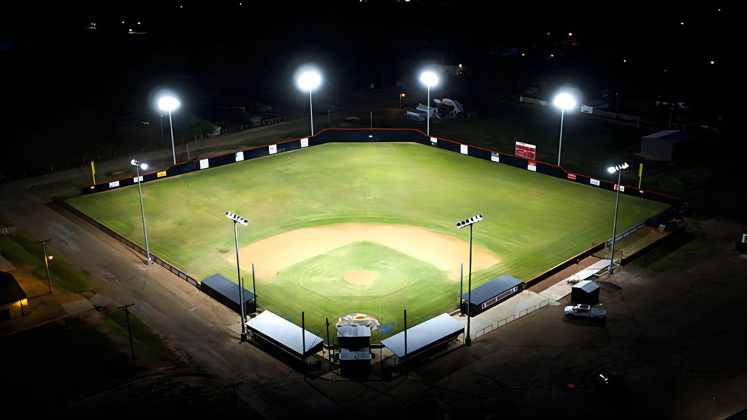 Baseball field at night with illuminated lights